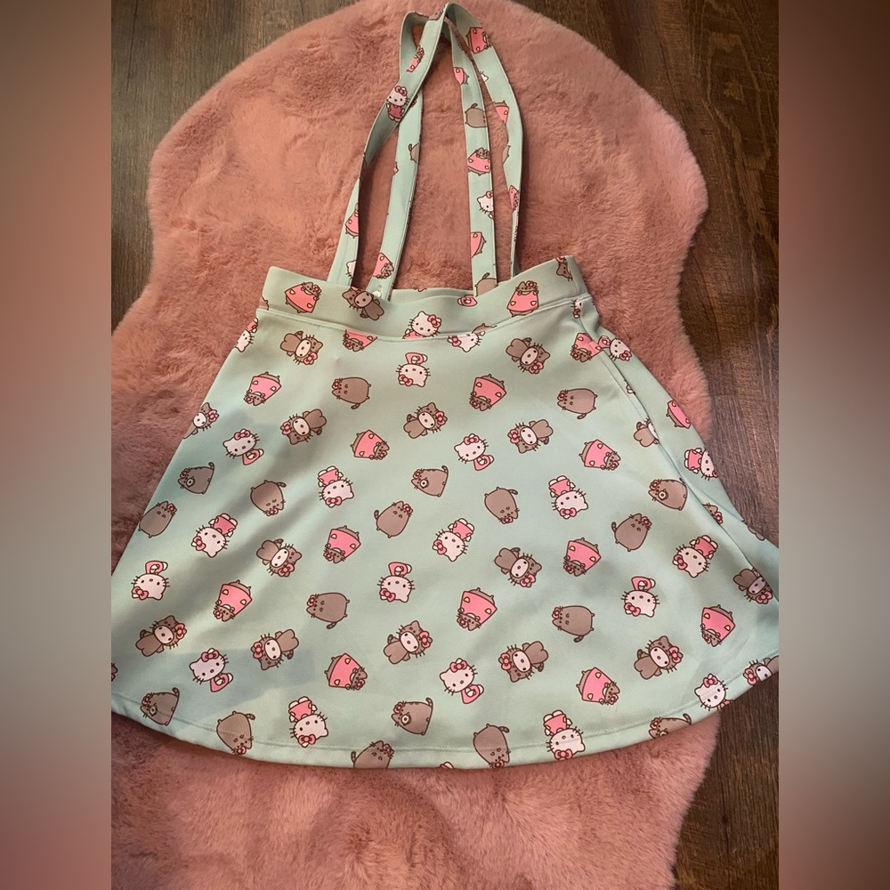 Hello kitty pusheen suspender dress. Size small. Work once. Hot topic